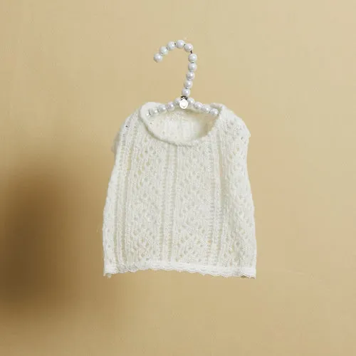 white knitted sleeveless top